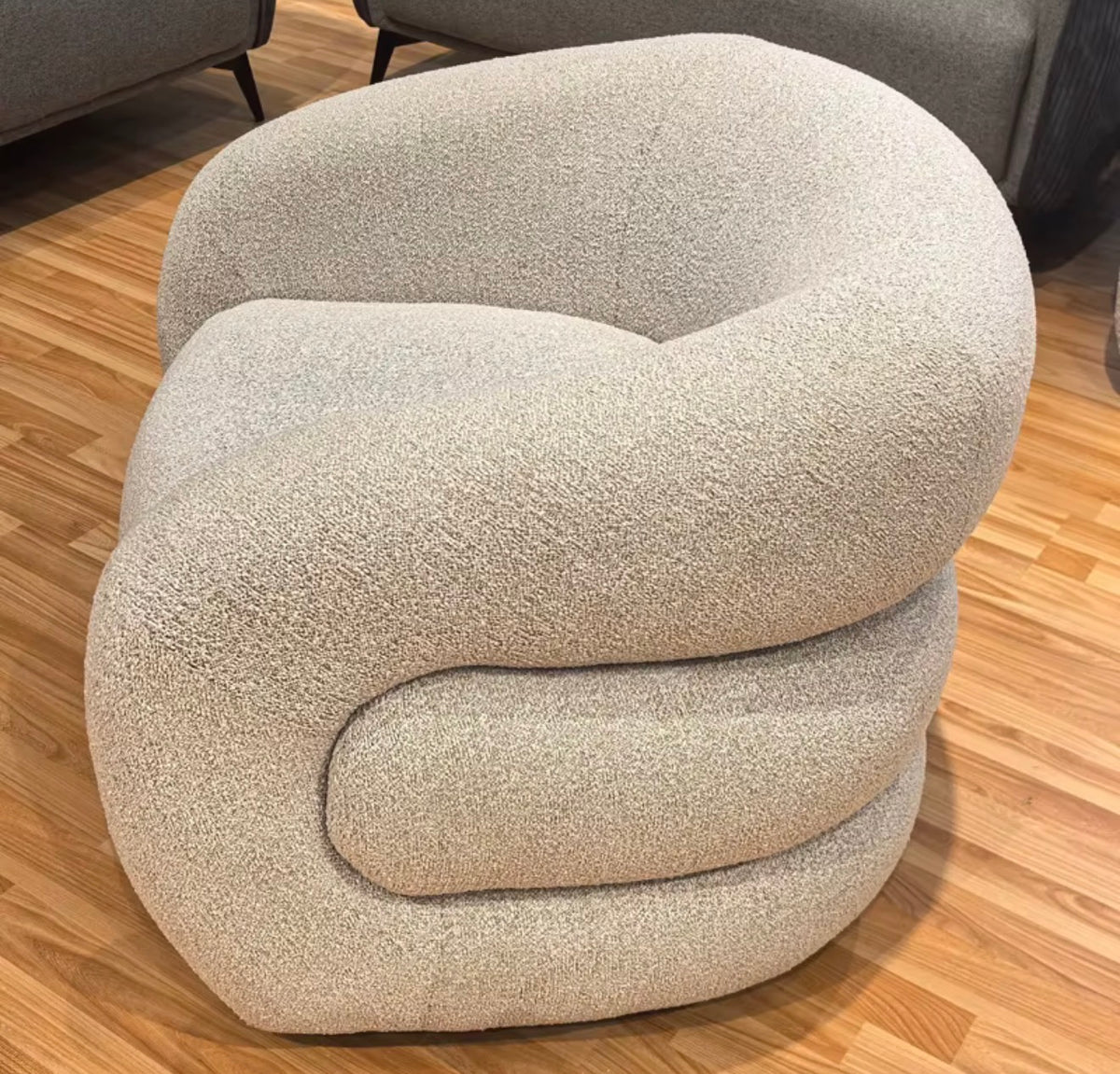 Sculptural Curved Accent Chair – Bouclé Upholstered